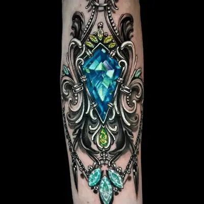 Intricate tattoo with blue gemstone and ornamental design.
