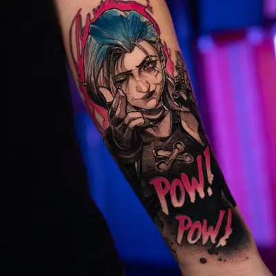 Tattoo of a character with blue hair pointing, word 'POW!' in pink.