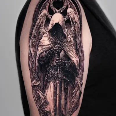 Tattoo of a hooded figure with wings holding a sword on an arm.