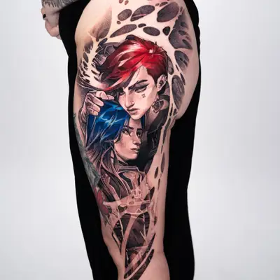 Detailed color tattoo on thigh featuring two stylized figures with red and blue hair.