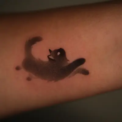 Simple black cat tattoo with blurred effect