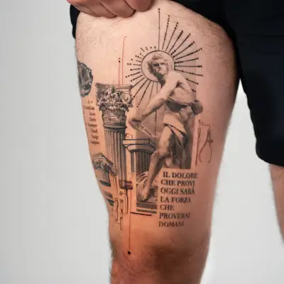 Thigh tattoo of a classical statue with text and columns.
