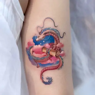 Colorful dragon tattoo with clouds and scroll