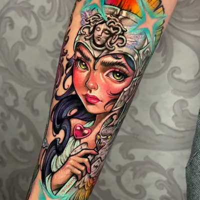 Colorful tattoo of a mythological female figure with an owl on her shoulder.