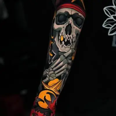 Colorful sleeve tattoo with skull and stars