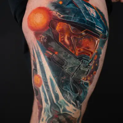 Color realism portrait tattoo of Master Chief holding an energy sword in a color realism style on a thigh.