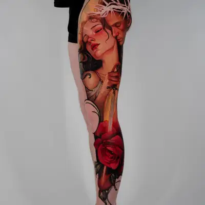 Leg sleeve tattoo of two figures with a red rose in a painterly realism style.