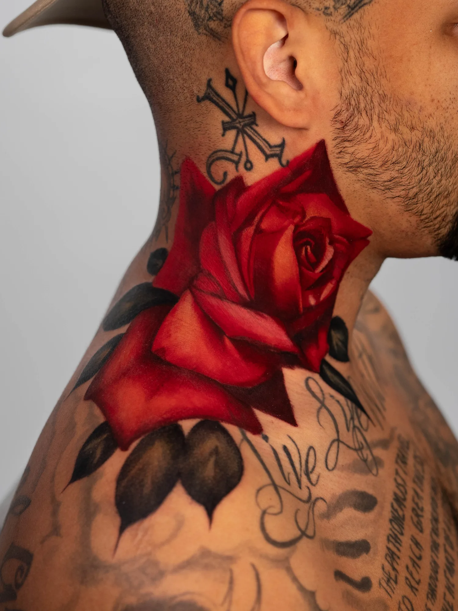 Color realism red rose on a neck.