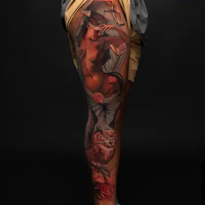 Leg sleeve tattoo of a woman and owl holding a rose.
