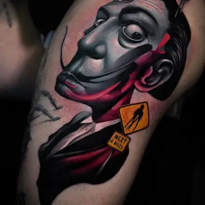 Stylized realistic portrait of Salvador Dali on a thigh.