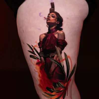 Tattoo of a woman bound with ropes, burning on a stake.