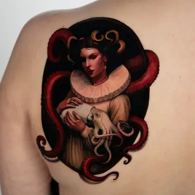 A painterly tattoo of a woman holding an octopus, with red tentacles wrapped around her.