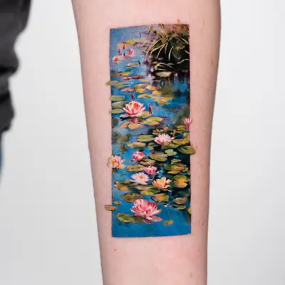Tattoo of Monet's Water Lilies painting on an inner forearm.