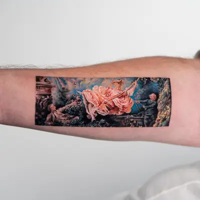 Painting tattoo of The Swing set on an inner forearm.