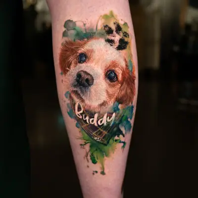 Watercolor dog tattoo on calf