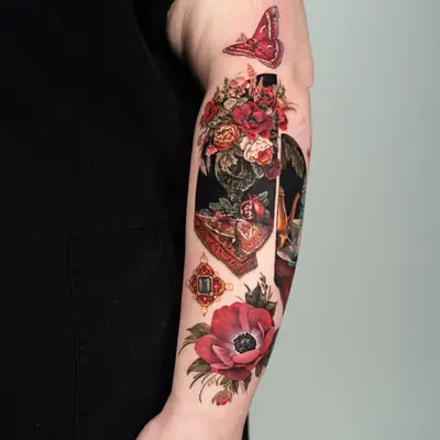 Large tattoo featuring smaller microrealism designs including a Dutch still life, gemstones, flowers, and a butterfly.