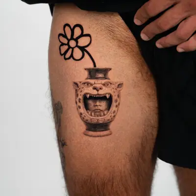 Tattoo of a surreal tiger vase holding portrait with an illustrative flower coming out. 
