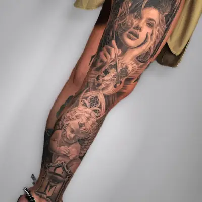 Leg tattoo depicting a woman's face and cherub in black and grey realism style.
