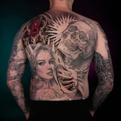 Tattoo of a woman's face and a skull on a man's back.