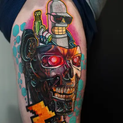 Cartoon robot and skull tattoo with vibrant colors on thigh.