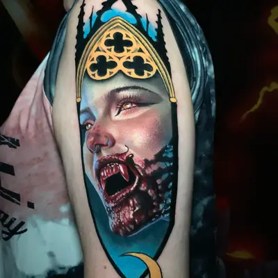 Vampire portrait tattoo with crown on upper arm.