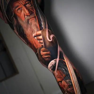 Realistic portrait tattoo of two characters holding weapons.