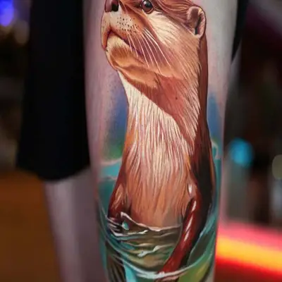 Realistic otter tattoo on thigh