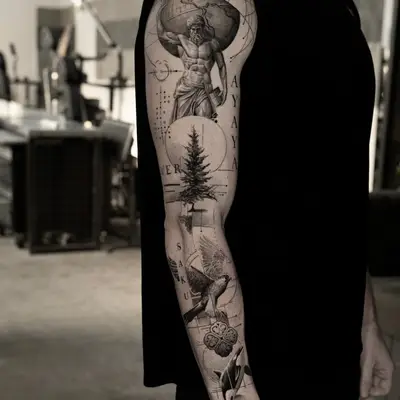 Black and grey full sleeve with Atlas holding the globe at the shoulder, a fir tree, a bird in flight, an ornamental rosette and an orca near the wrist.