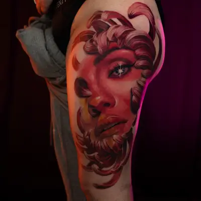 Color realism tattoo on the outer thigh of Selena Gomez washed in reds and magentas, framed by curling crimson chrysanthemum petals in place of hair, with a white star-shaped glint in one eye.