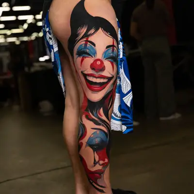 The classic Chicano tattoo subject matter of "Laugh now, cry later" is redifined in this retro pop art inspired leg panel.