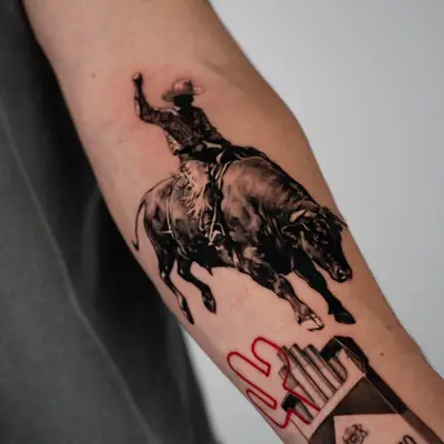 Tattoo of a cowboy riding a bull next to a Marlboro cigarette pack.