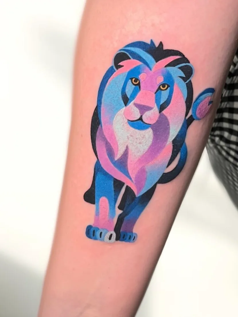 Colorful abstract lion tattoo on forearm.
