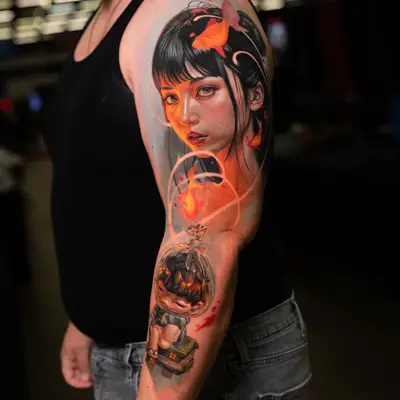 Colorful half sleeve tattoo featuring a girl, goldfish, and a boy in a glass bubble.