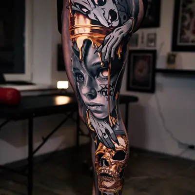 Tattoo of a melting gold skull and cartoon character embracing a woman's face.
