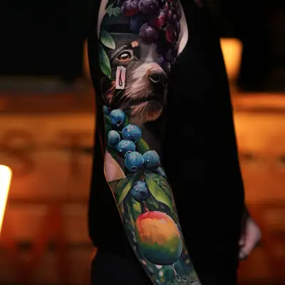 Color realism full sleeve of fruit and a dog that covers an older shoulder tattoo
