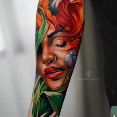 Color realism forearm tattoo of a woman's face framed by a red tulip and green leaves