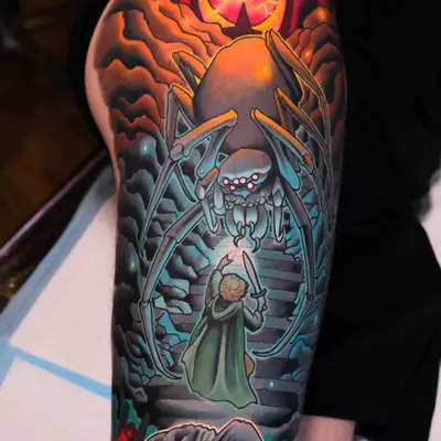 Lord of the Rings tattoo featuring Samwise fighting Shelob on a thigh.