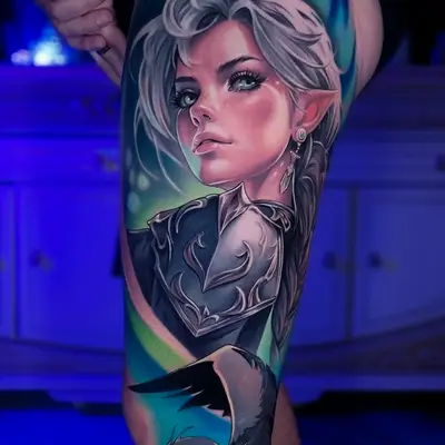 A colorful painting and realistic style tattoo of a character with long white hair and a dragon-like creature on a leg.