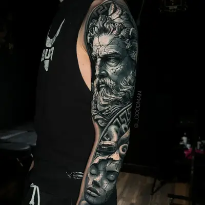 Realistic full sleeve tattoo of Greek god portrait and woman bust.
