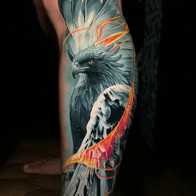 Detailed eagle tattoo with vibrant flames