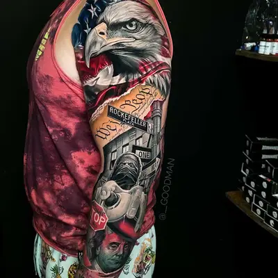 Full sleeve tattoo of eagle, American flag, and various symbols.